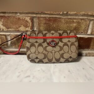 Coach Wristlet needs you